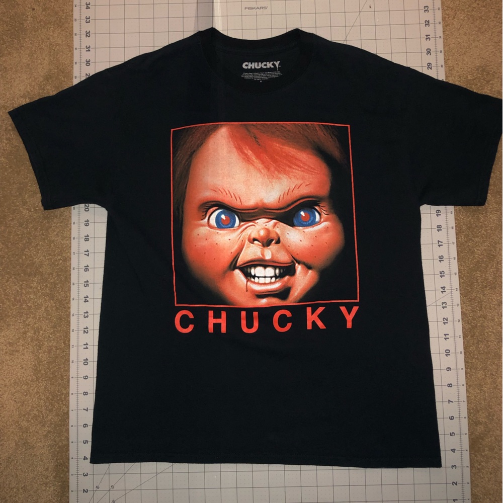 Chucky. Size large. Black. Short sleeve shirt.